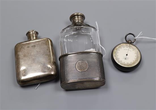 A Victorian engine-turned silver-mounted spirit flask, monogrammed, London 1867, makers Williamson & Horton and two other items,